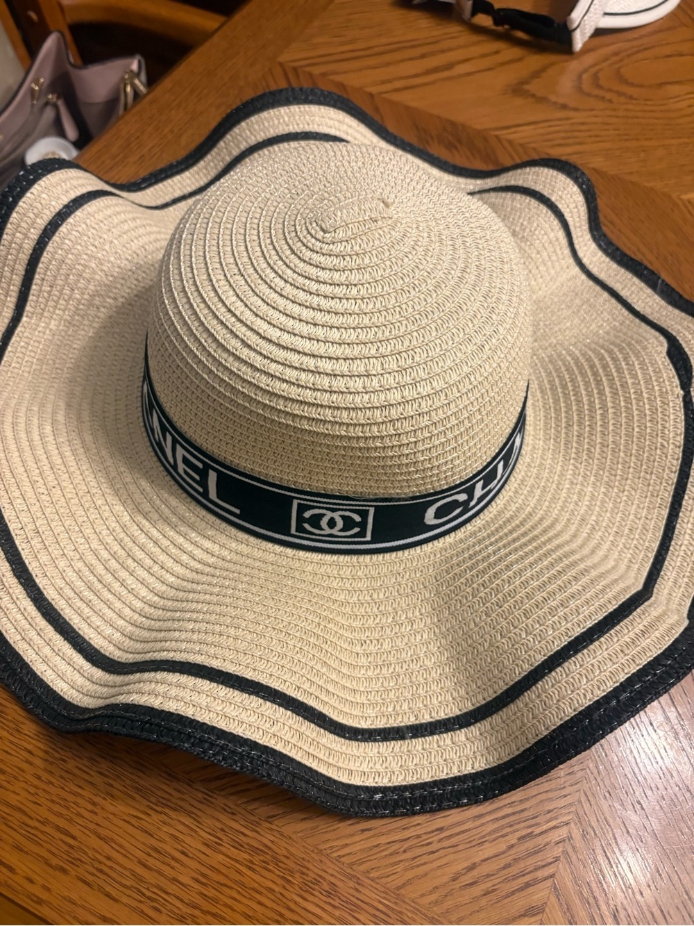 Beige Straw Sun Hat with Black Trim and Logo Band